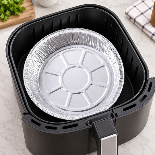 Foil bowl fitted inside an air fryer basket