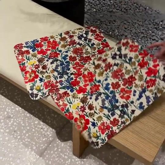Floral table mats arranged on a dining table