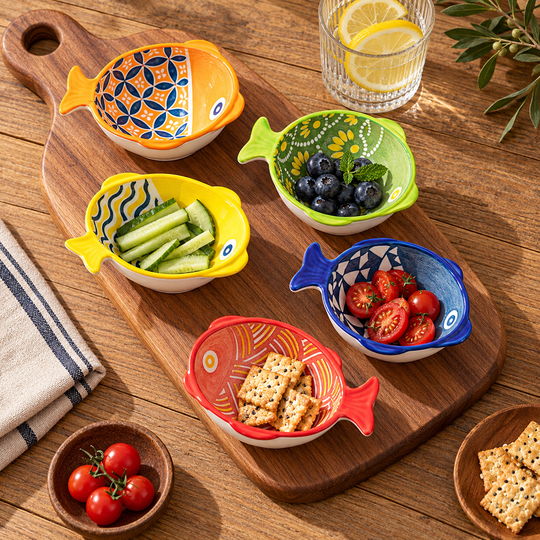 Colourful fish ceramic serving bowls overhead