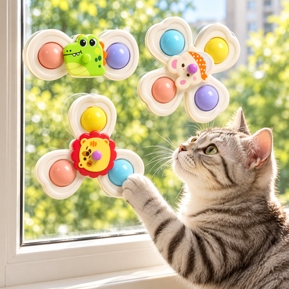 Animal Suction Spinner Toy — cat beside window display