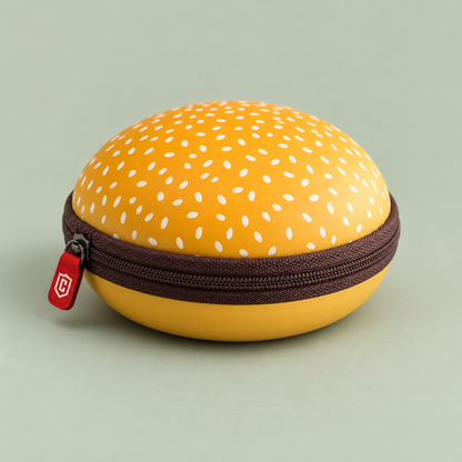 Closed yellow sesame-print burger watch case with brown perimeter zipper