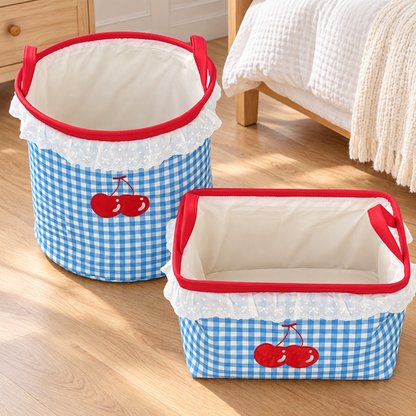 Two open-top cherry gingham storage baskets showing interiors