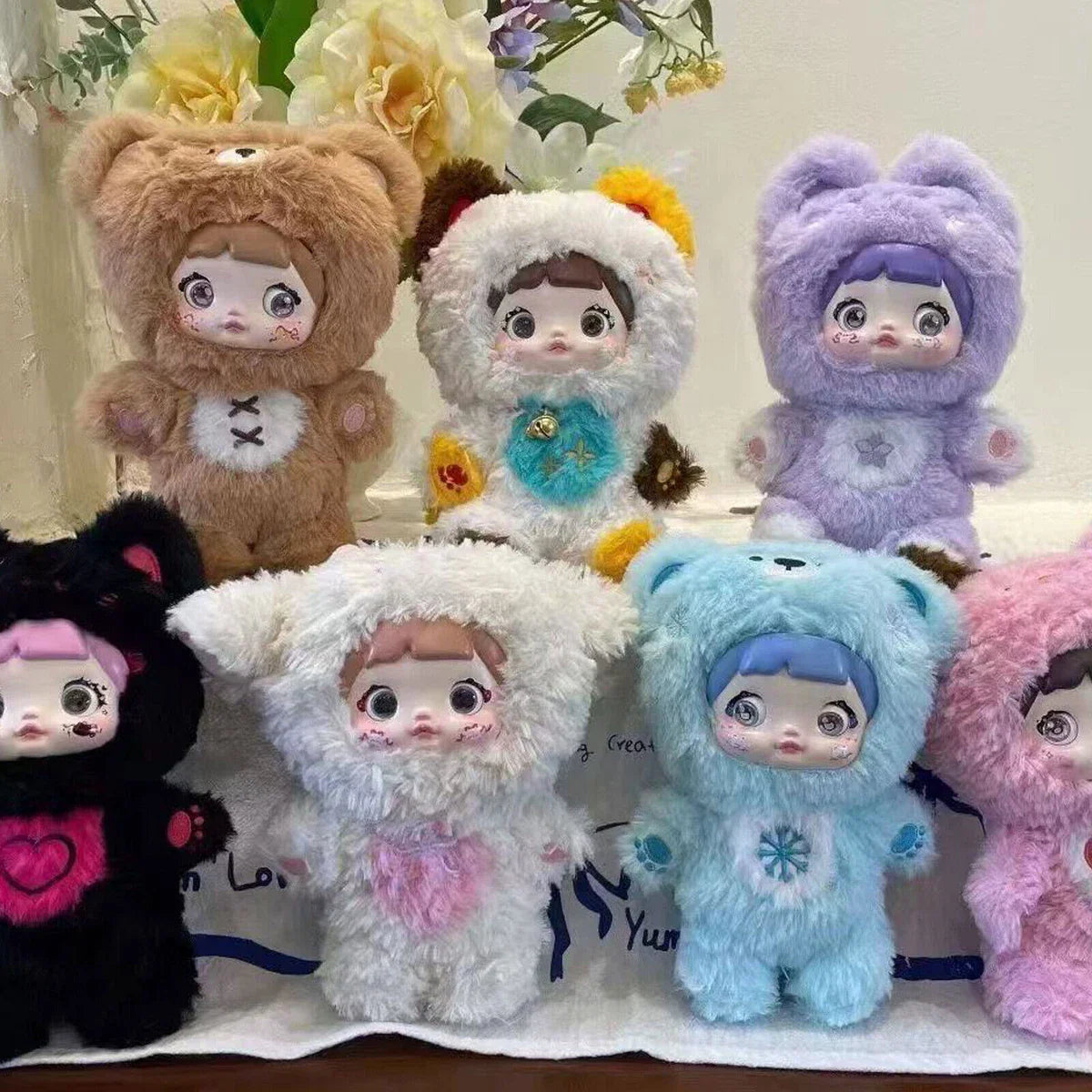 Nommi Plush Charm