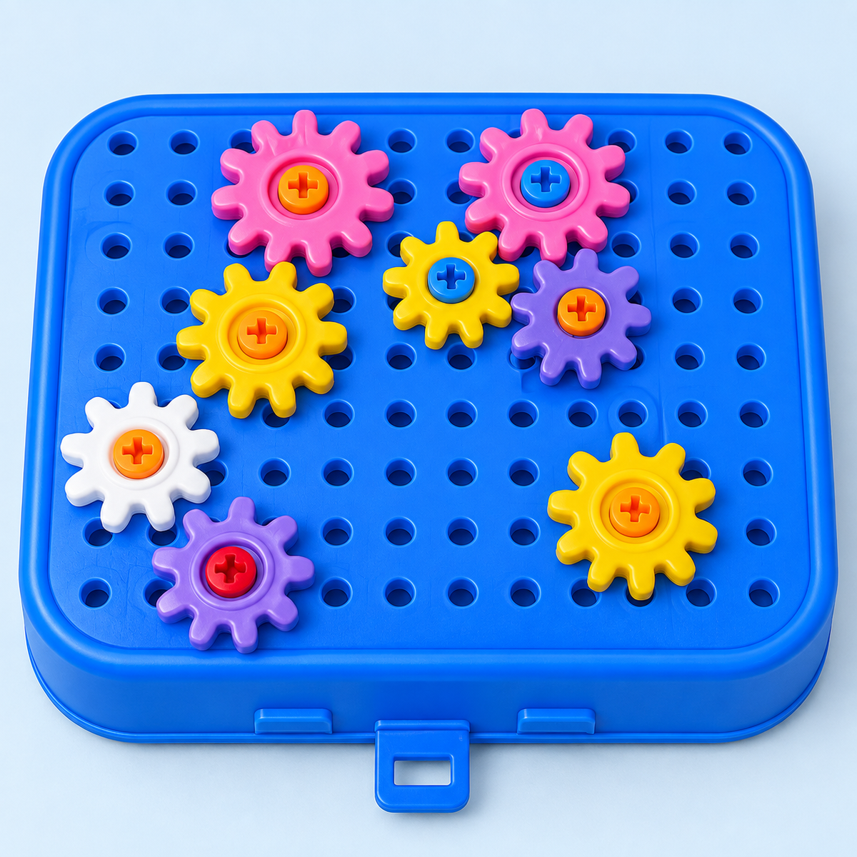 Colourful gears on perforated board