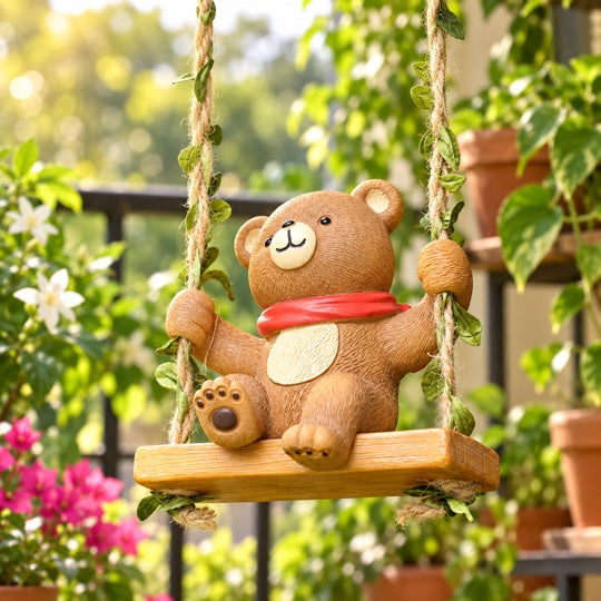 Swinging Bear Garden Décor in a balcony garden