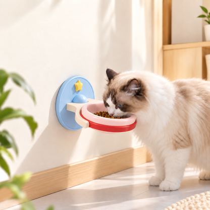 Cat using raised wall pet bowl