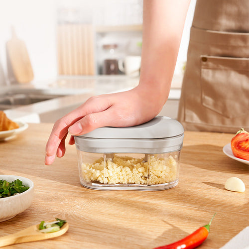 Hand  push garlic cutter